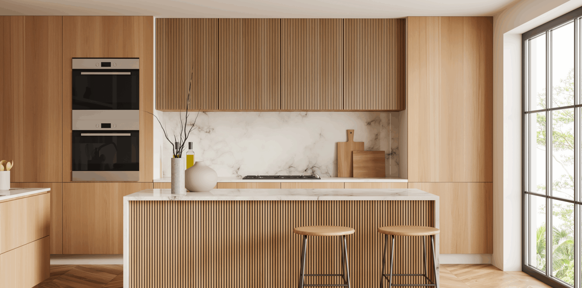 Modern kitchen with wood cabinetry and marble backsplash.